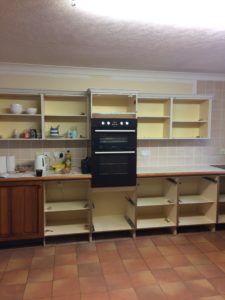 tired old pine kitchen cabinets and oven before new year make over