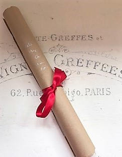 brown paper wrapped Christmas gift