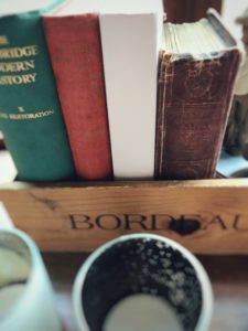 Vintage Books in wooden box with candles