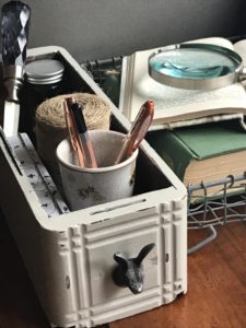 painted vintage drawer with hare handle used as storage in the study