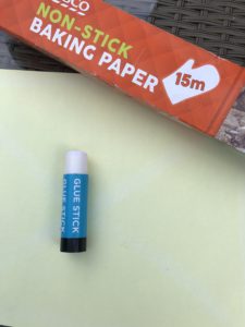 Greaseproof paper and glue stick