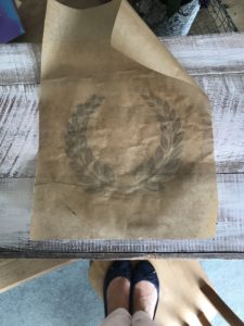 transferred laurel wreath motif on greaseproof paper