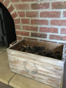 Painted DIY wooden box with kindling