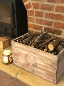 Painted DIY wooden box with kindling