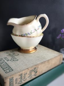 Books and china jug and bowl