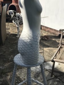 vintage mannequin with chicken wire skirt