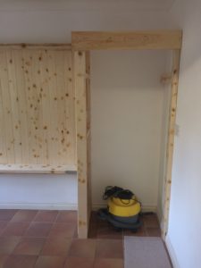 wooden cupboard taking shape in utility room