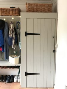 hand built cupboard in utility room