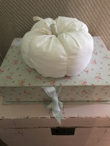 large cotton pumpkin on flower file on pink box for halloween decoration ideas