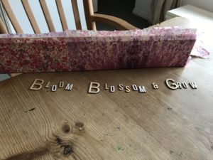 selecting wooden letters for DIY decoupage sign