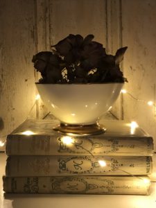 little bowl dried hydrangea french books and twinkle lights