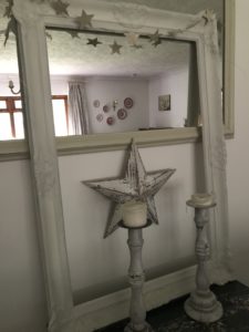 mirror frame star star garland and candlesticks in faffing session