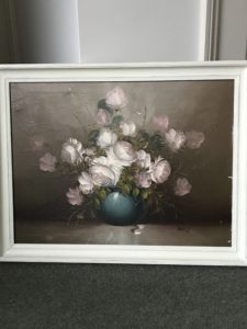 oil painting in teal vase in white frame