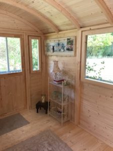 view of inside shepherds hut before decorating fully