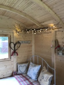 rustic twig heart and bough with lights for christmas decorations