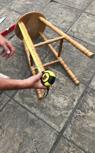 bar stools being measured before sawing