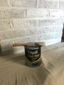 white painted bricks stain block and brush for fireplace makeover