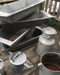 vintage zinc urns and troughs and watering cans at spring fair