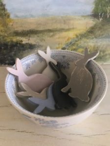 small wooden bunnies in vintage blue and white bowl with watercolour from spring fair