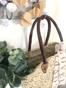 basket garland and greenery in spring decor