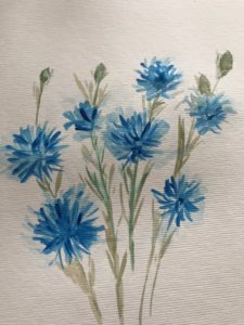 practicing cornflower acrylic painting for homemade signs