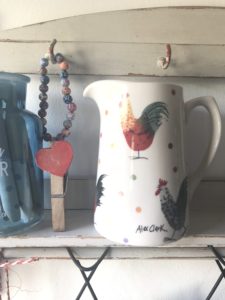 Alex Clark hen jugs, heart peg, coloured beads and glass bottle