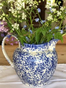 blue spongewear jugs with spring flowers