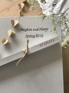 stenciled garden tray with heart paper garland plant markers and cow parsley