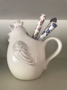 cream hen jugs and vintage teaspoons