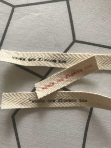 fabric typewritten labels used for mini glass jars for diy flower arrangements jar crafts