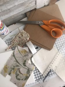 scissors, material, ruler and glue needed for handmade cards