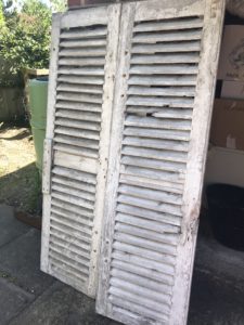 rustic shutters for use in vintage home decor - farmhouse shutters