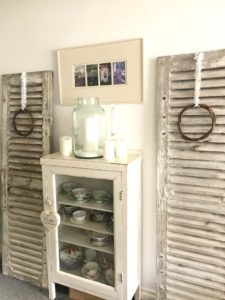 french farmhouse shutters with simple wreaths create shabby chic wall decor