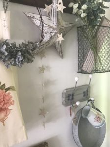 wall coat hooks repuposed for hanging decorations