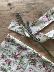 lavender sprigs and floral vintage cloth used to make lavender wreaths