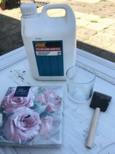 glue, napkins and sponge for decoupage on wood on antique armoire doors