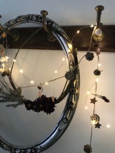 autumn decor - pretty foraged autumn garland with silver frame and fairy lights