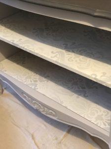 adding shelves to linen storage cabinet