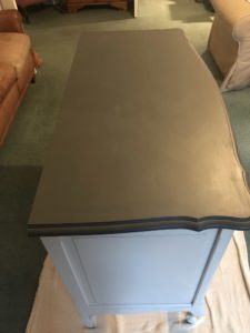 dark grey painted top of up-cycled linen storage cabinet