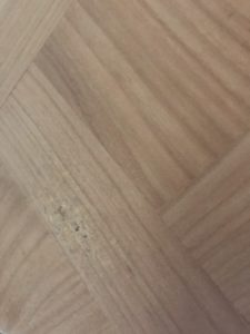 parquet top of linen storage cabinet