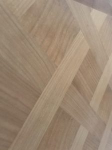 parquet top of linen storage cabinet