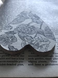 old book page covers wooden heart for easy to make christmas decorations