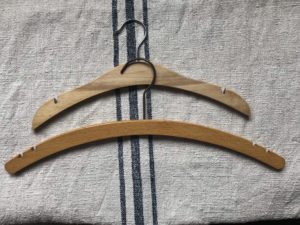 wooden coat hangers will become painted wooden hangers