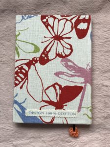 how to cover a notebook with fabric - pretty linen with moths