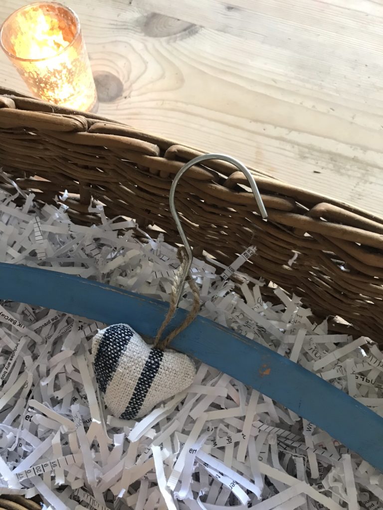 wooden coat hanger with linen heart