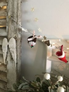 clay christmas decoration garland with angel wings and misteltoe 