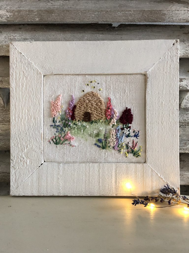 distressed painted picture frame and embroidery