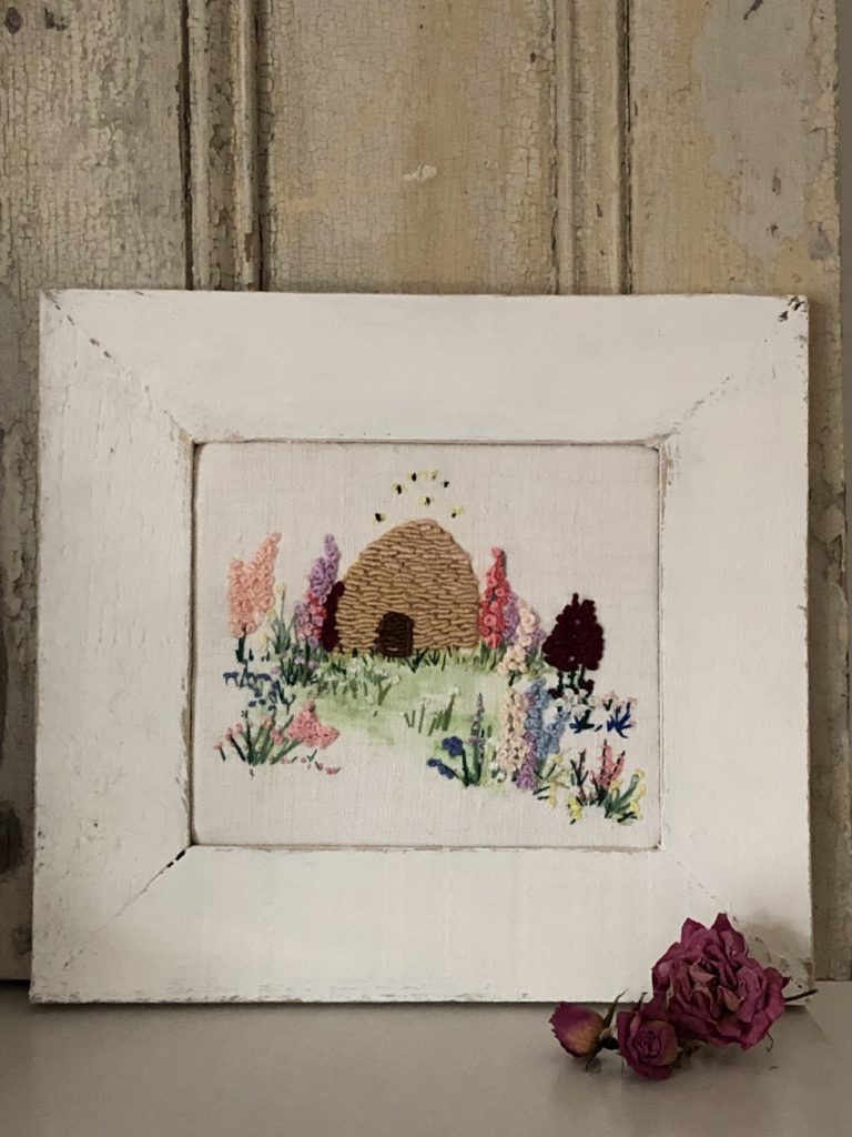 distressed painted picture frame and embroidery