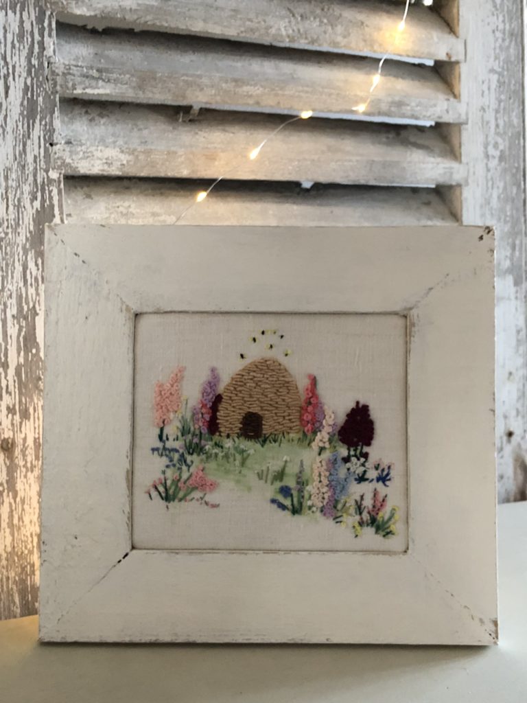 distressed painted picture frame and embroidery