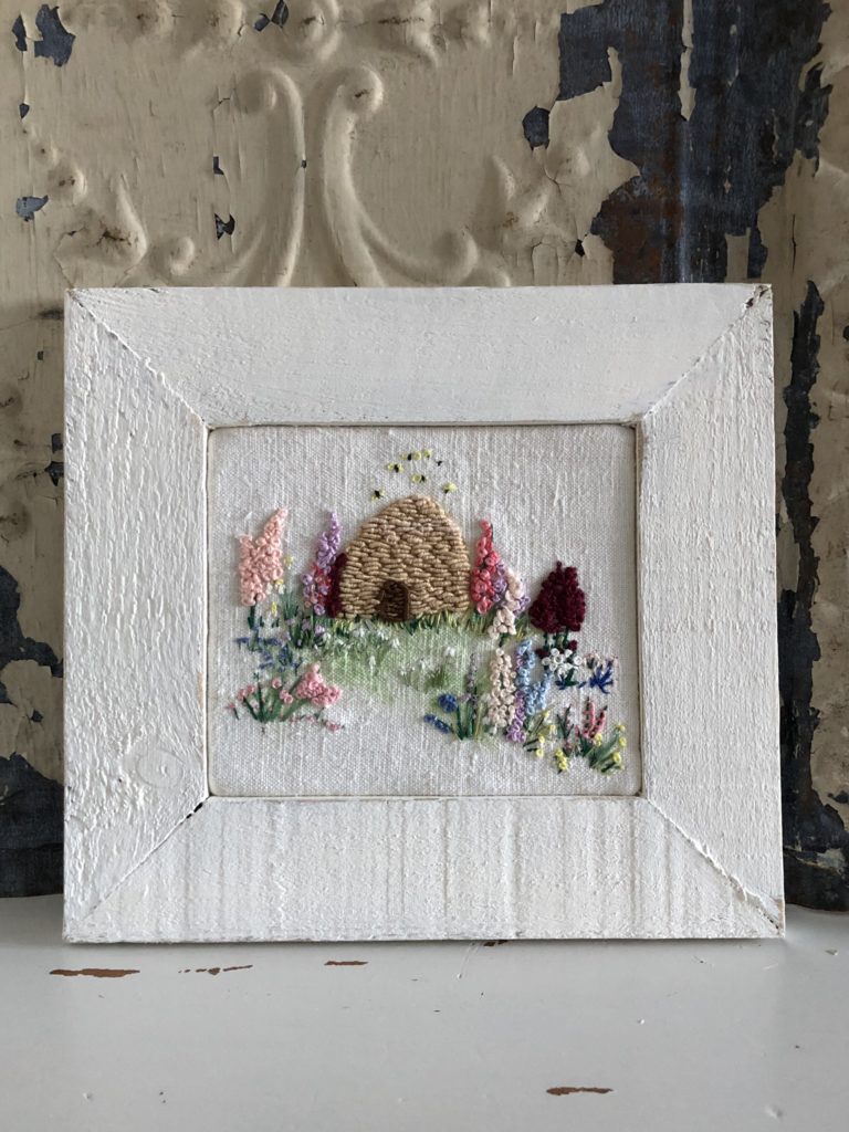 distressed painted picture frame and embroidery